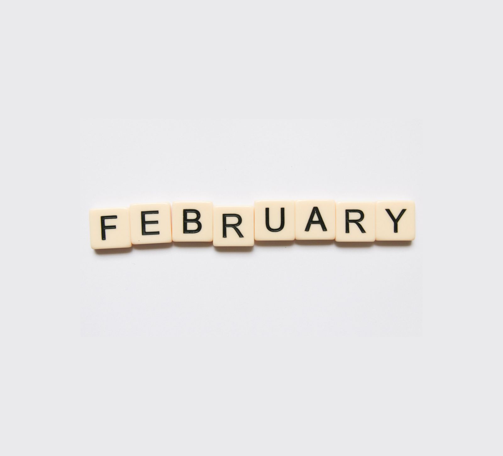 Kitchen Table CEOS Blog 15 Post Ideas for February - image of scrabble tiles spelling February